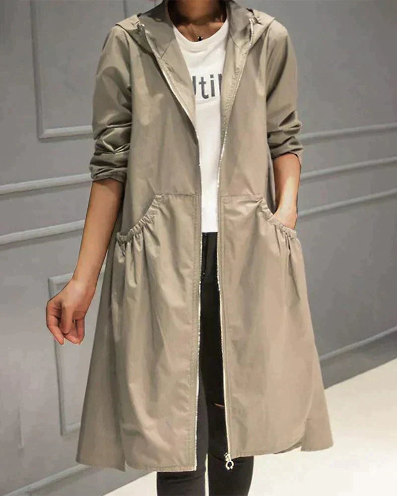 Wasserdichte Regenjacke für Damen mit langem Schnitt | Moderne