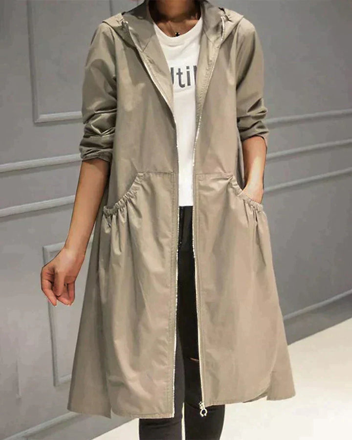 Wasserdichte Regenjacke für Damen mit langem Schnitt | Moderne