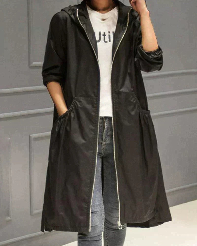 Wasserdichte Regenjacke für Damen mit langem Schnitt | Moderne