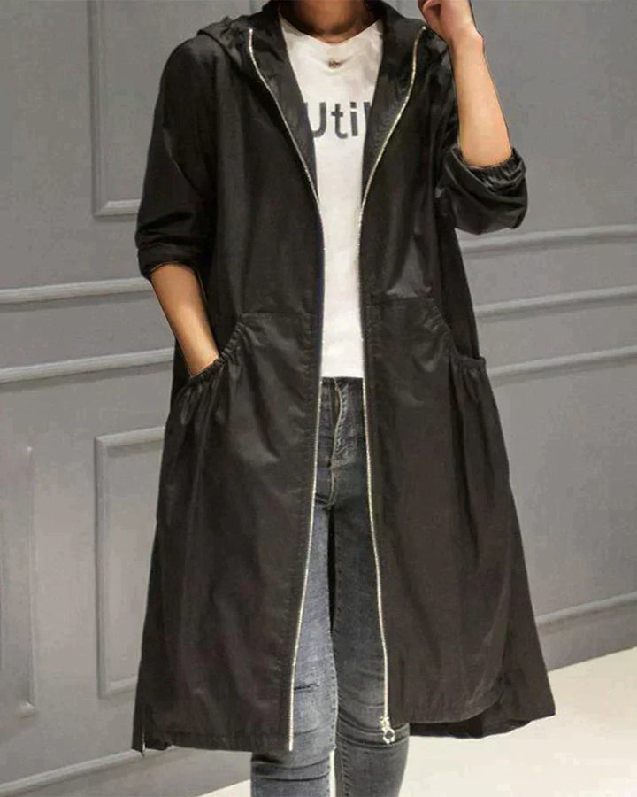 Wasserdichte Regenjacke für Damen mit langem Schnitt | Moderne