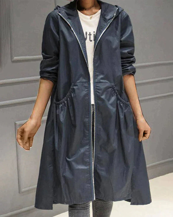 Wasserdichte Regenjacke für Damen mit langem Schnitt | Moderne