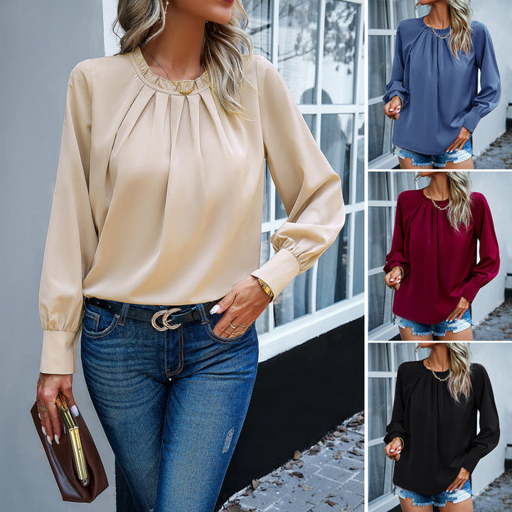 Elegante plissierte bluse mit langen ärmeln