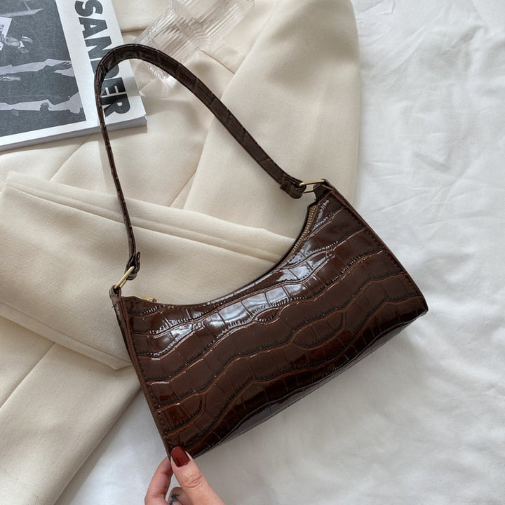 Elegante handtasche mit robustem reißverschluss und zwei trageoptionen